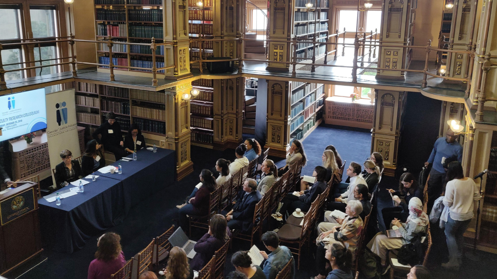 Colloquium 2019, picture of audience from above in Riggs Library