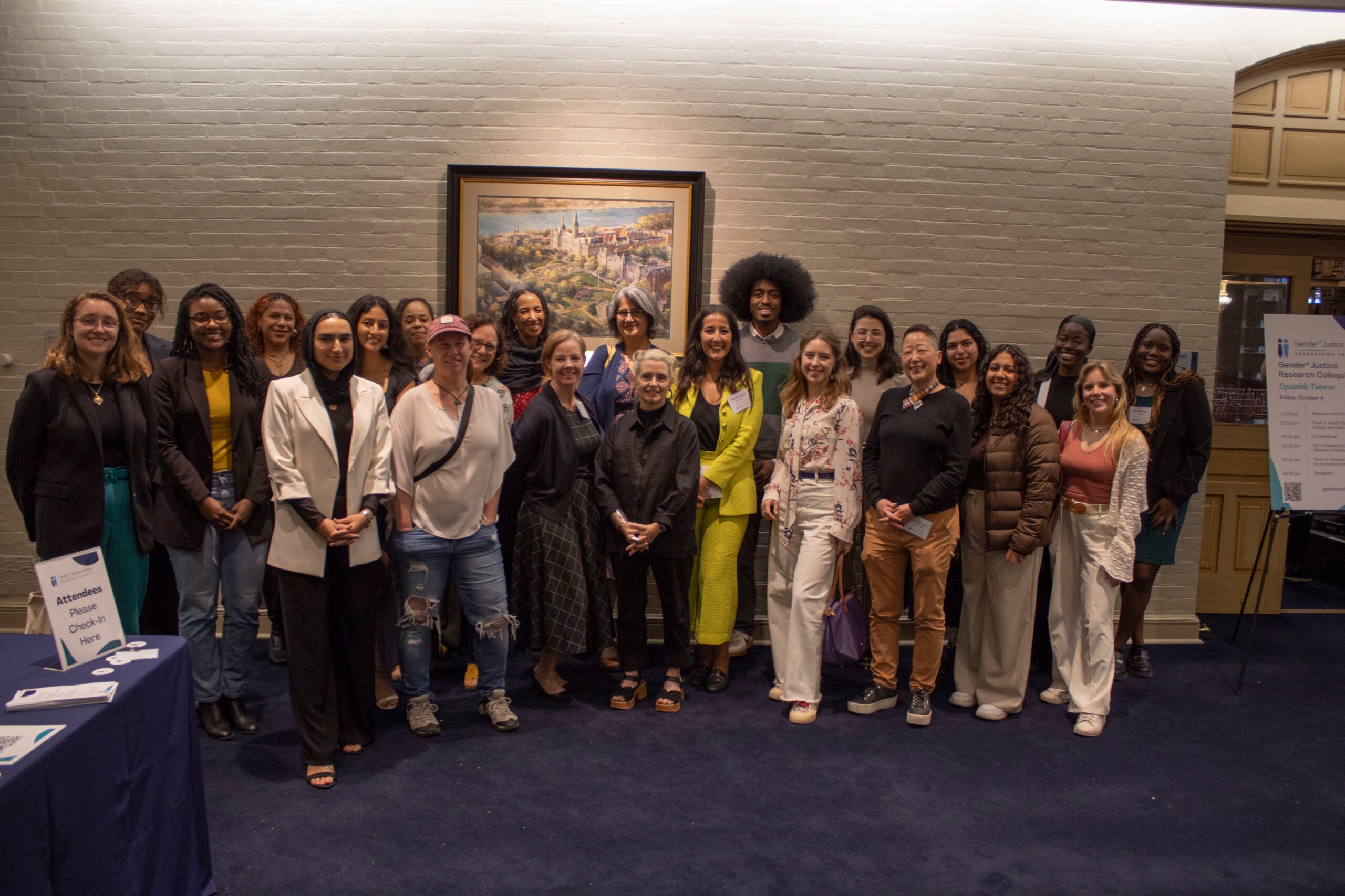 A group photo of colloquium panelists and attendees.