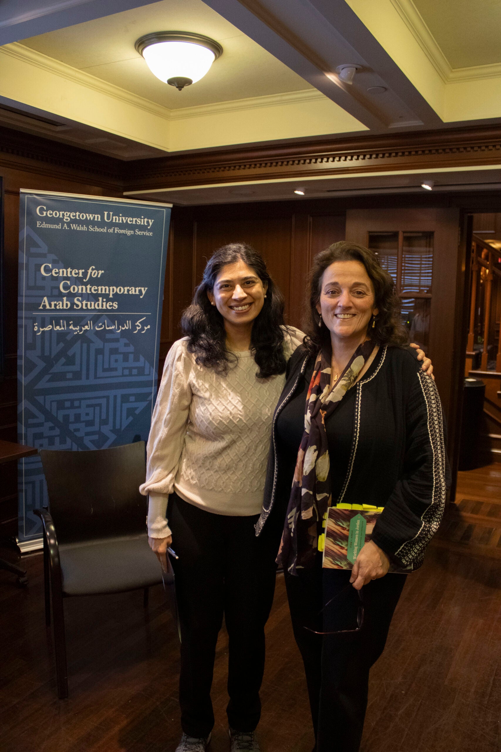 Dr. Khoja-Moolji and Dr. Adely smile for a picture.